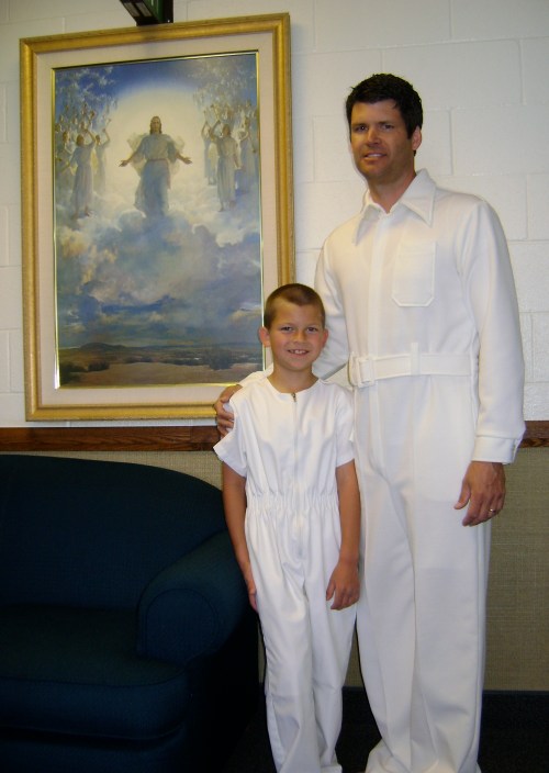 Jack and Dad dressed in white for the baptism.
